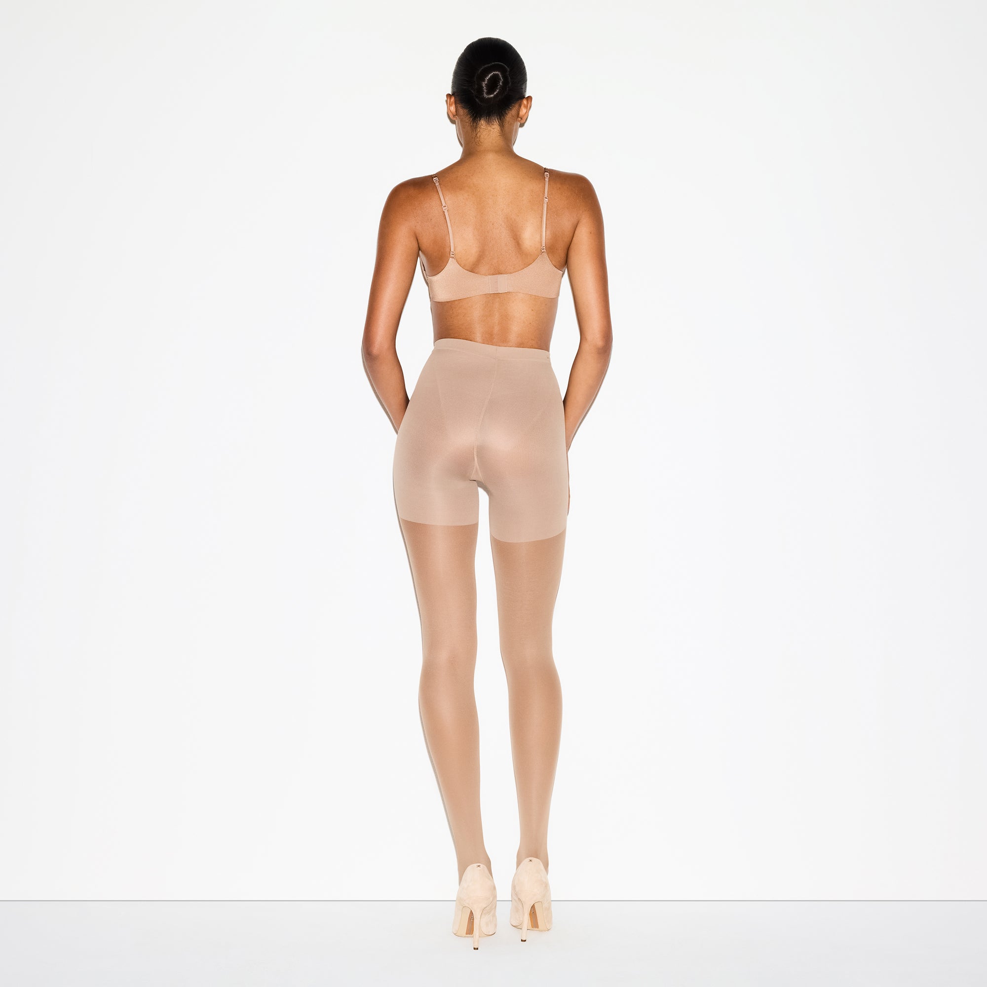 HOSIERY SHAPING TIGHTS | SIENNA ON A MODEL FRONT VIEW @