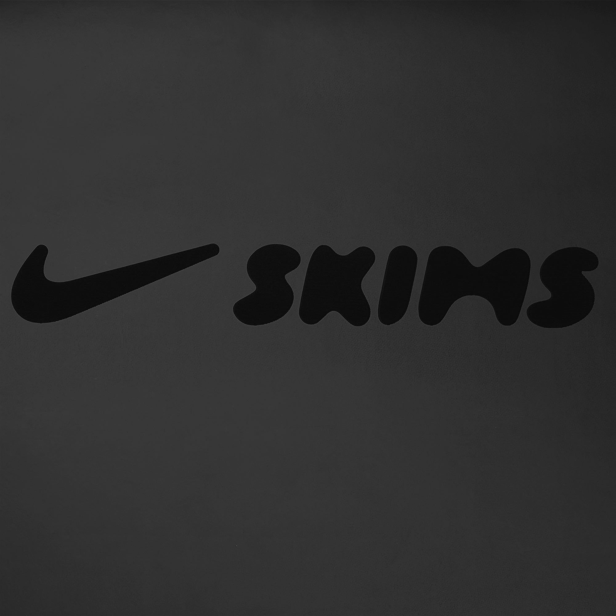 NikeSKIMS ACCESSORIES YOGA MAT | OBSIDIAN & LAYS FLAT ON A WHITE BACKGROUND | FLT