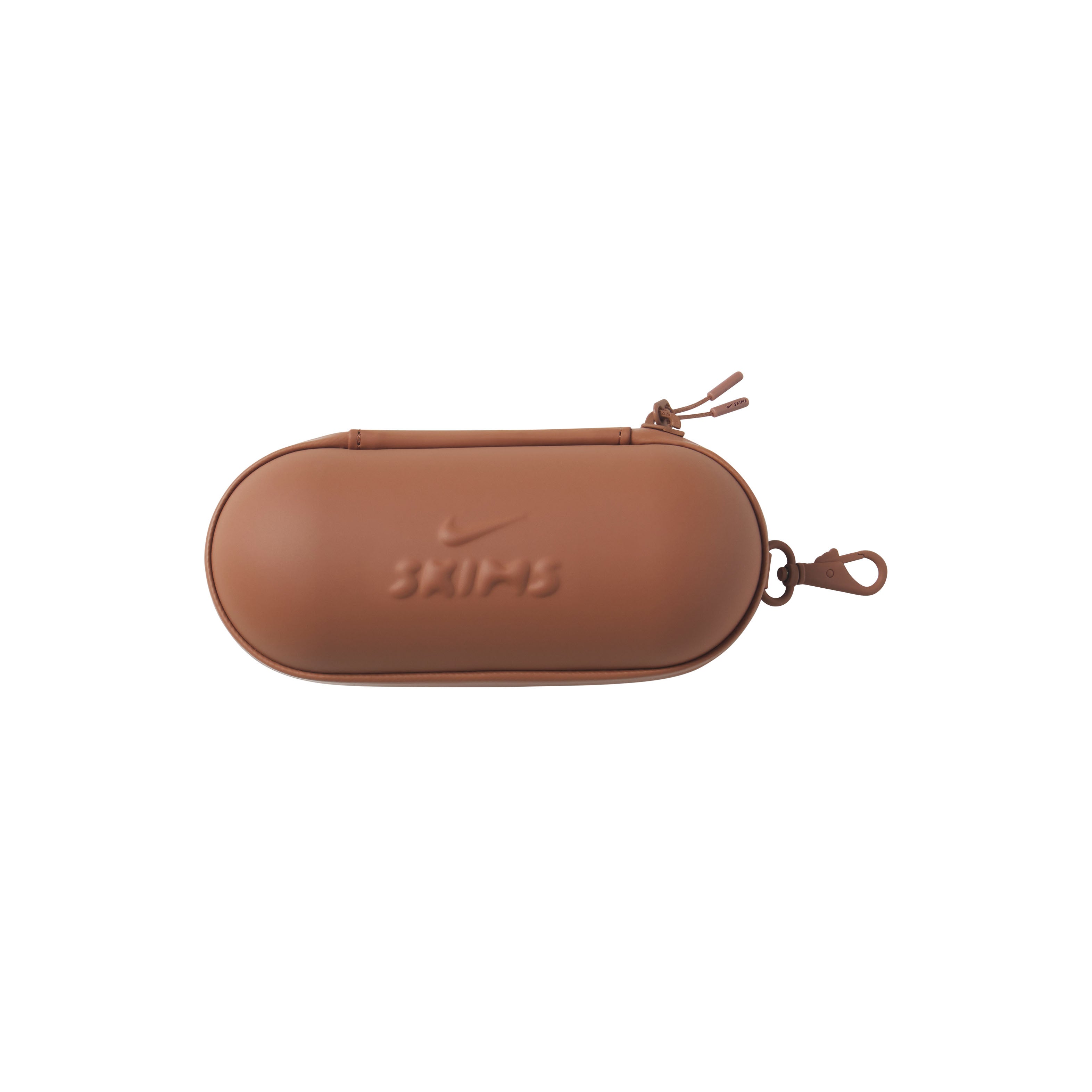 NikeSKIMS ACCESSORIES HARDSHELL GLASSES CASE | CAROB BROWN & LAYS FLAT ON A WHITE BACKGROUND | FLT