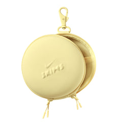 NikeSKIMS ACCESSORIES HARDSHELL ROUND CASE | BICYCLE YELLOW & LAYS FLAT ON A WHITE BACKGROUND | FLT