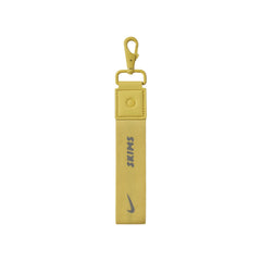 NikeSKIMS ACCESSORIES KEYCHAIN WRISTLET | CITRINE & LAYS FLAT ON A WHITE BACKGROUND | FLT