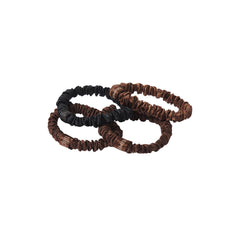 SLIP X SKIMS PURE SILK SKINNY SCRUNCHIES 4-PACK | DEEP FLAT ON A WHITE BACKGROUND | FLT @ | FOCUS: 0.9, 0.1, 0.7