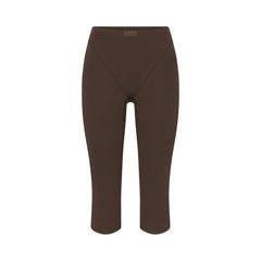 NikeSKIMS MATTE 17" V-LINE CROP LEGGING | DARK SEPIA FLAT ON A WHITE BACKGROUND | FLT