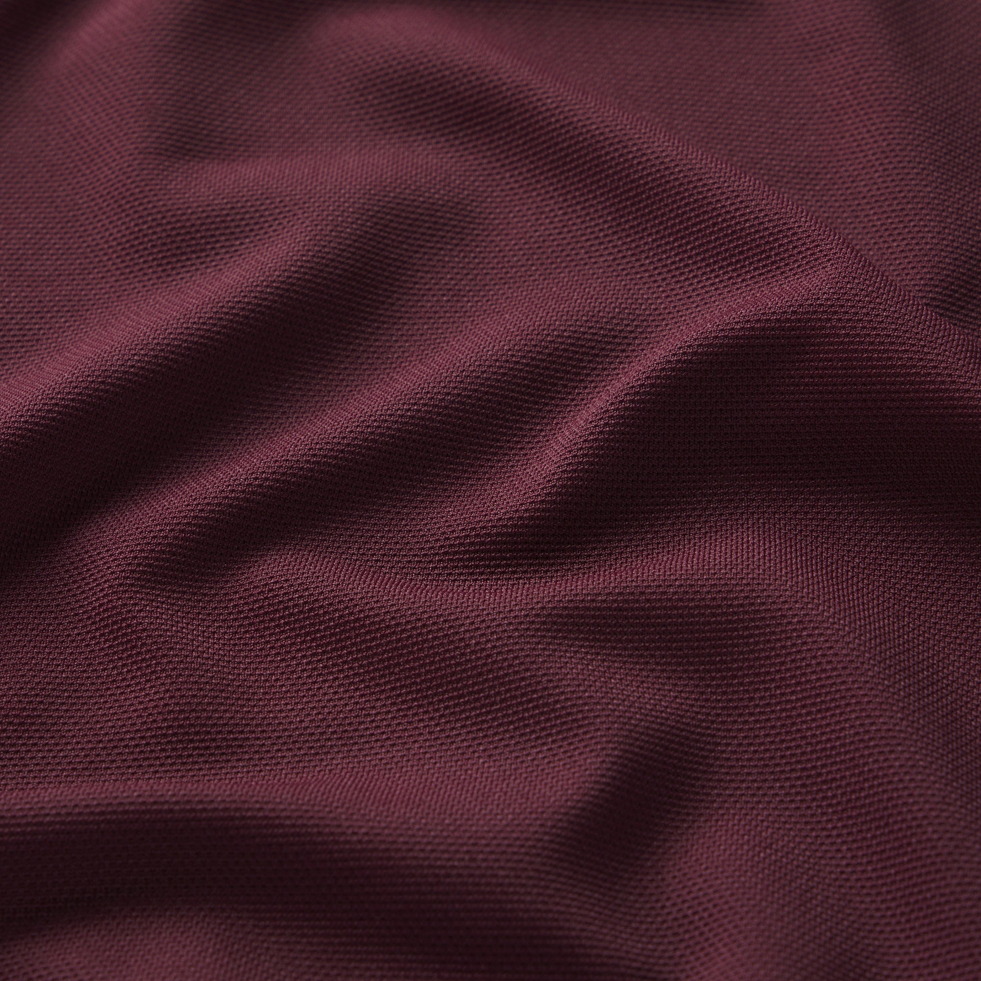 NikeSKIMS AIRY LONG SLEEVE CREW NECK TOP | CURRANT ON A MODEL SIDE VIEW @ | FOCUS: 0.0, 1.0, 0.9