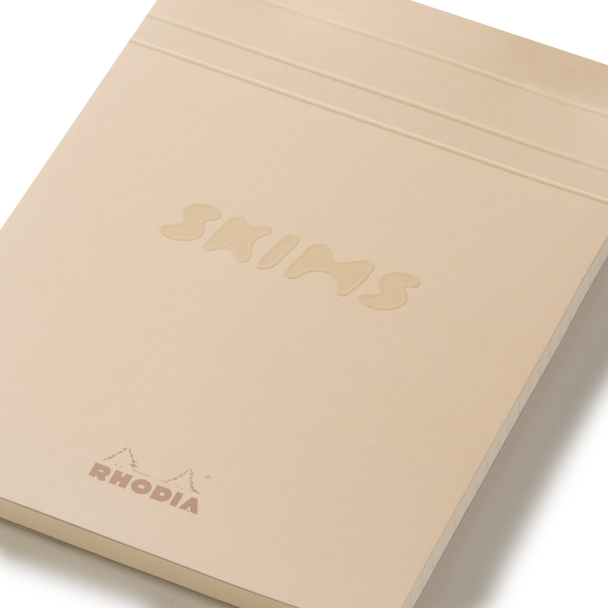 RHODIA X SKIMS NOTEPAD SET | NEUTRAL MULTI & LAYS FLAT ON A WHITE BACKGROUND | FLT