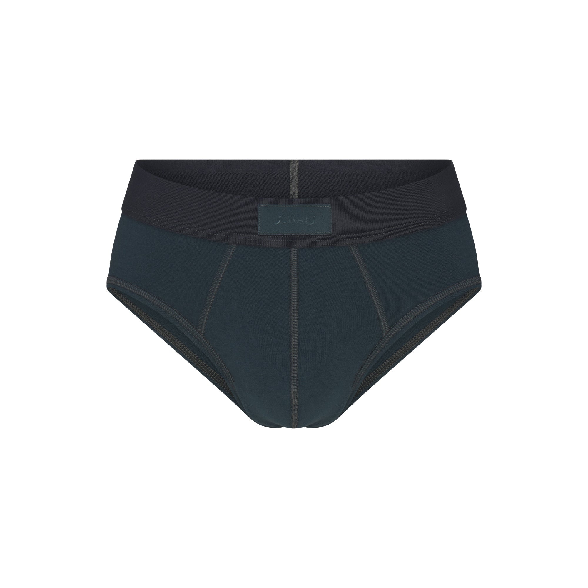 SKIMS COTTON MENS BRIEF | VERDANT FLAT ON A WHITE BACKGROUND | FLT