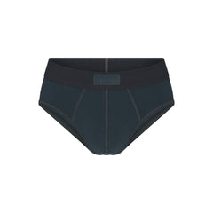 SKIMS COTTON MENS BRIEF | VERDANT FLAT ON A WHITE BACKGROUND | FLT