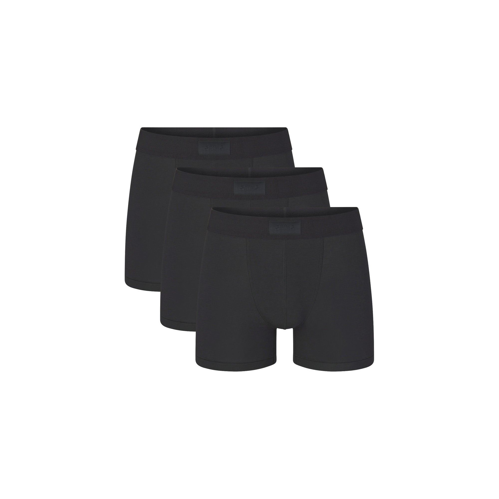 SKIMS COTTON MENS 3" BOXER BRIEF 3-PACK | ONYX (MENS BOXERS, MENS UNDERWEAR) LAYS FLAT ON A WHITE BACKGROUND | FLT  | FOCUS: 0.0, 1.0, 0.9