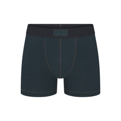 SKIMS COTTON MENS 3" BOXER BRIEF | VERDANT FLAT ON A WHITE BACKGROUND | FLT