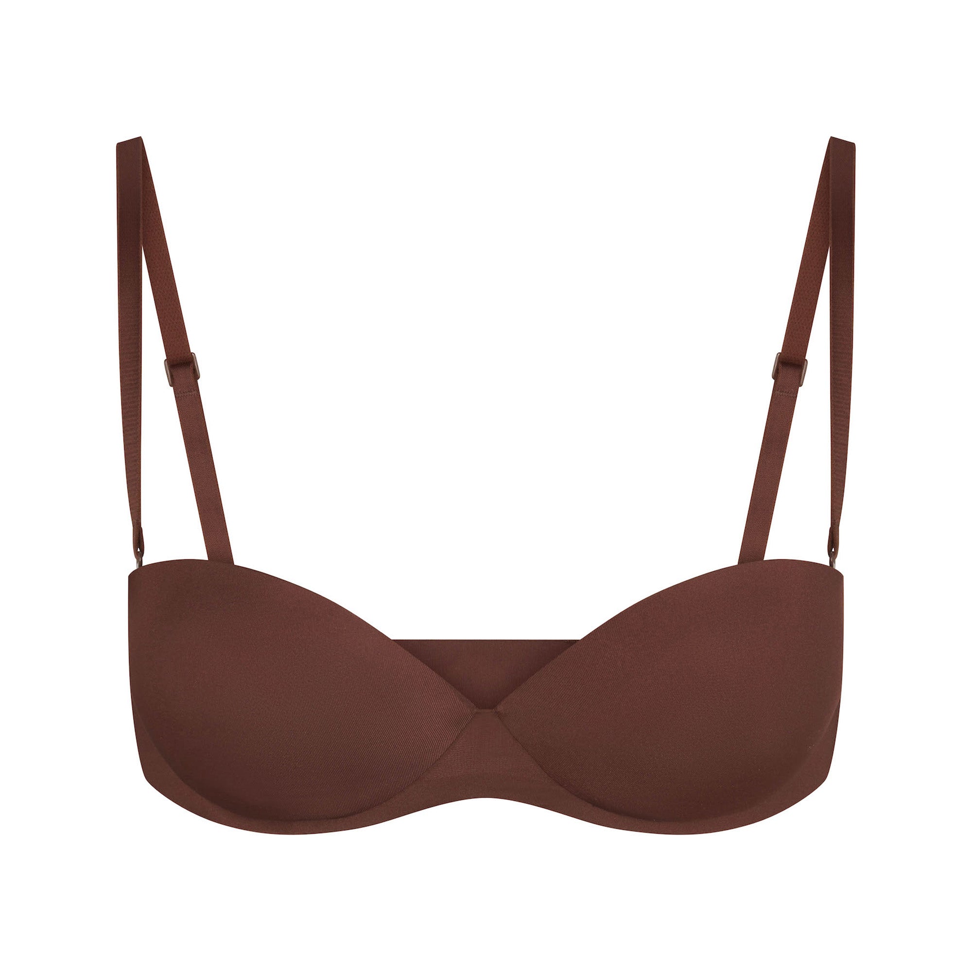 SKIMS ULTIMATE BRA STRAPLESS PUSH-UP BRA LAYS FLAT ON A WHITE BACKGROUND | FLT