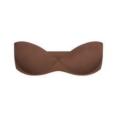 SKIMS ULTIMATE BRA STRAPLESS PUSH-UP BRA | JASPER (PUSH-UP BRAS) LAYS FLAT ON A WHITE BACKGROUND | FLT