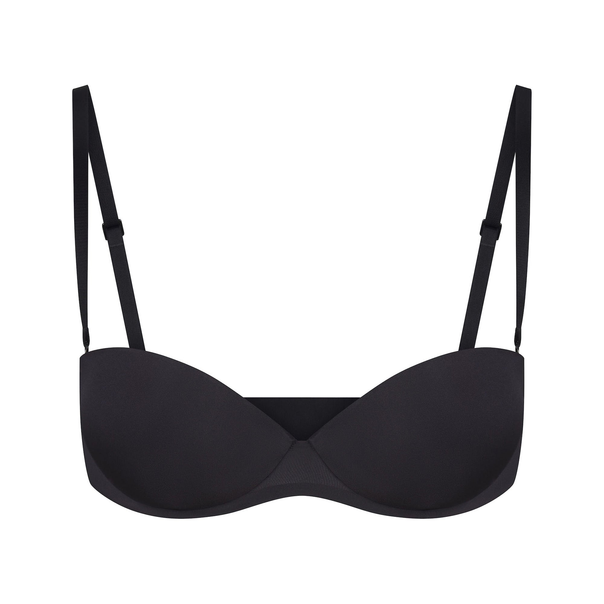 SKIMS ULTIMATE BRA STRAPLESS PUSH-UP BRA LAYS FLAT ON A WHITE BACKGROUND | FLT