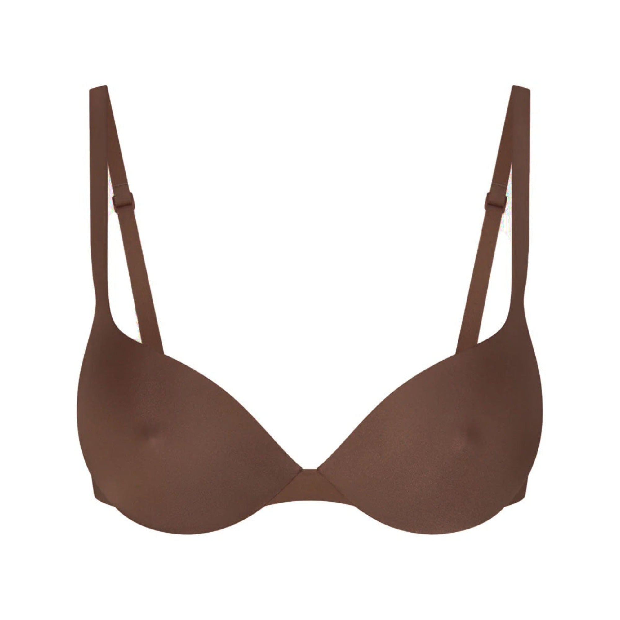 SKIMS ULTIMATE BRA NIPPLE PUSH-UP BRA | JASPER LAYS FLAT ON A WHITE BACKGROUND | FLT