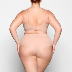 NAKED SCOOP BRA ON A MODEL BACK VIEW