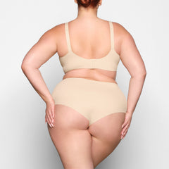NAKED SCOOP BRA ON A MODEL BACK VIEW