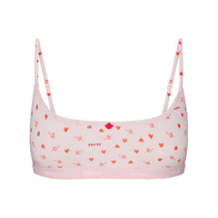 LIGHTWEIGHT COTTON LOGO PICOT SCOOP BRALETTE | BABY PINK ARROWED HEARTS LAYS FLAT ON A WHITE BACKGROUND | FLT 
