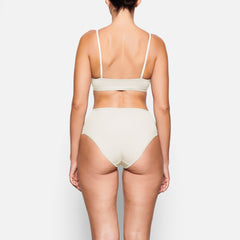 COTTON JERSEY SCOOP BRALETTE WORN BY A MODEL IN BACK VIEW