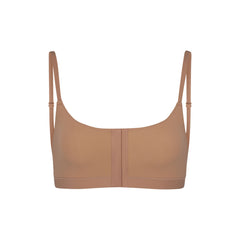 ADAPTIVE FITS EVERYBODY SCOOP BRALETTE | SIENNA (ADAPTIVE BRALETTES) LAYS FLAT ON A WHITE BACKGROUND | FLT