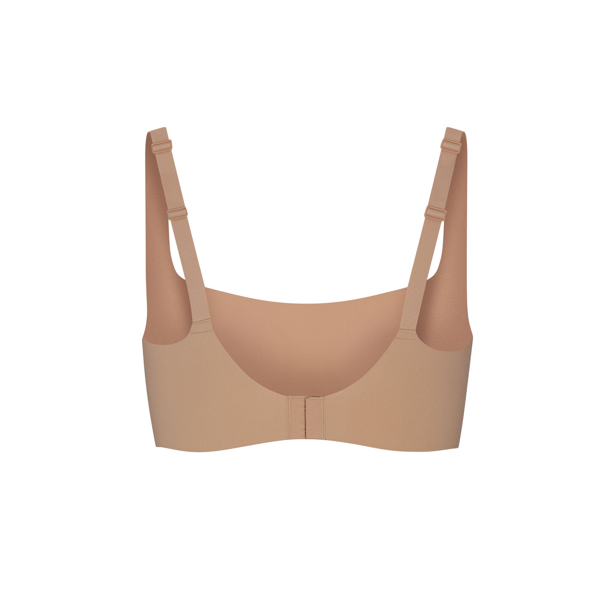 NAKED SCOOP BRA LAYS FLAT ON A WHITE BACKGROUND | FLT