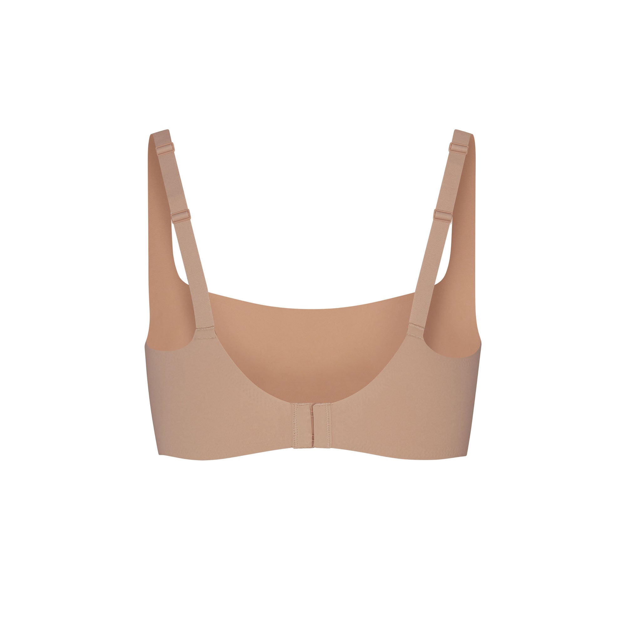 NAKED SCOOP BRA LAYS FLAT ON A WHITE BACKGROUND | FLT