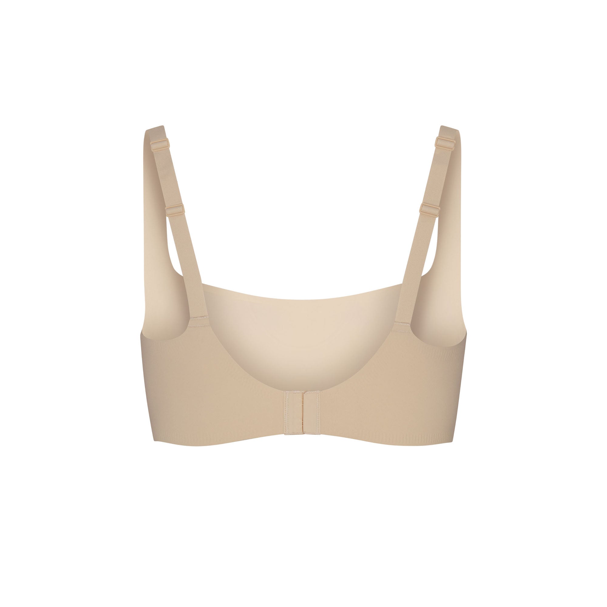 NAKED SCOOP BRA LAYS FLAT ON A WHITE BACKGROUND | FLT