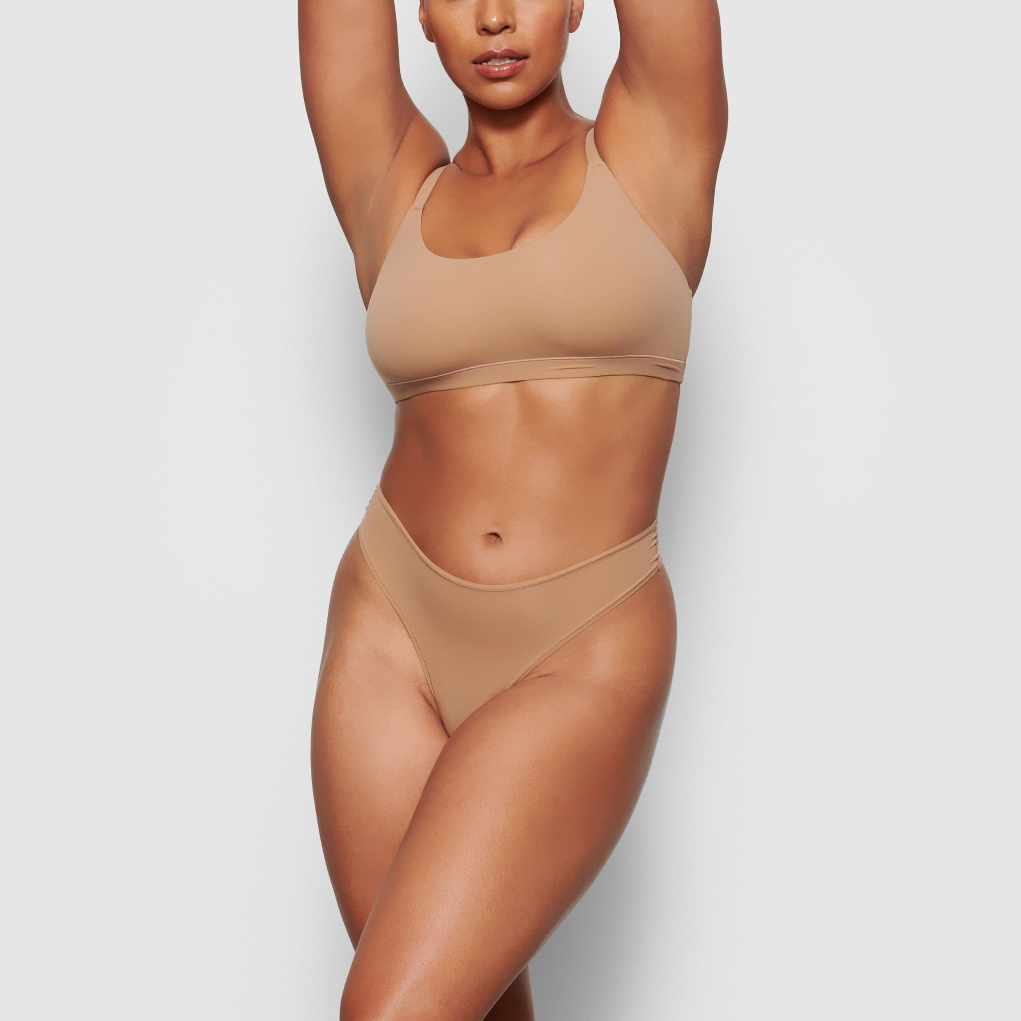 ON A MODEL FRONT VIEW FITS EVERYBODY SCOOP NECK BRA IN SIENNA, XL