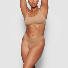 ON A MODEL FRONT VIEW FITS EVERYBODY SCOOP NECK BRA IN SIENNA, XL