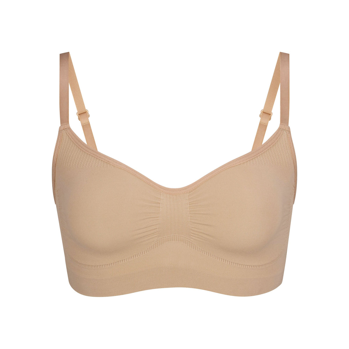 SEAMLESS SCULPT BRALETTE | CLAY (SHAPEWEAR BRALETTES, BRAS) LAYS FLAT ON A WHITE BACKGROUND | FLT