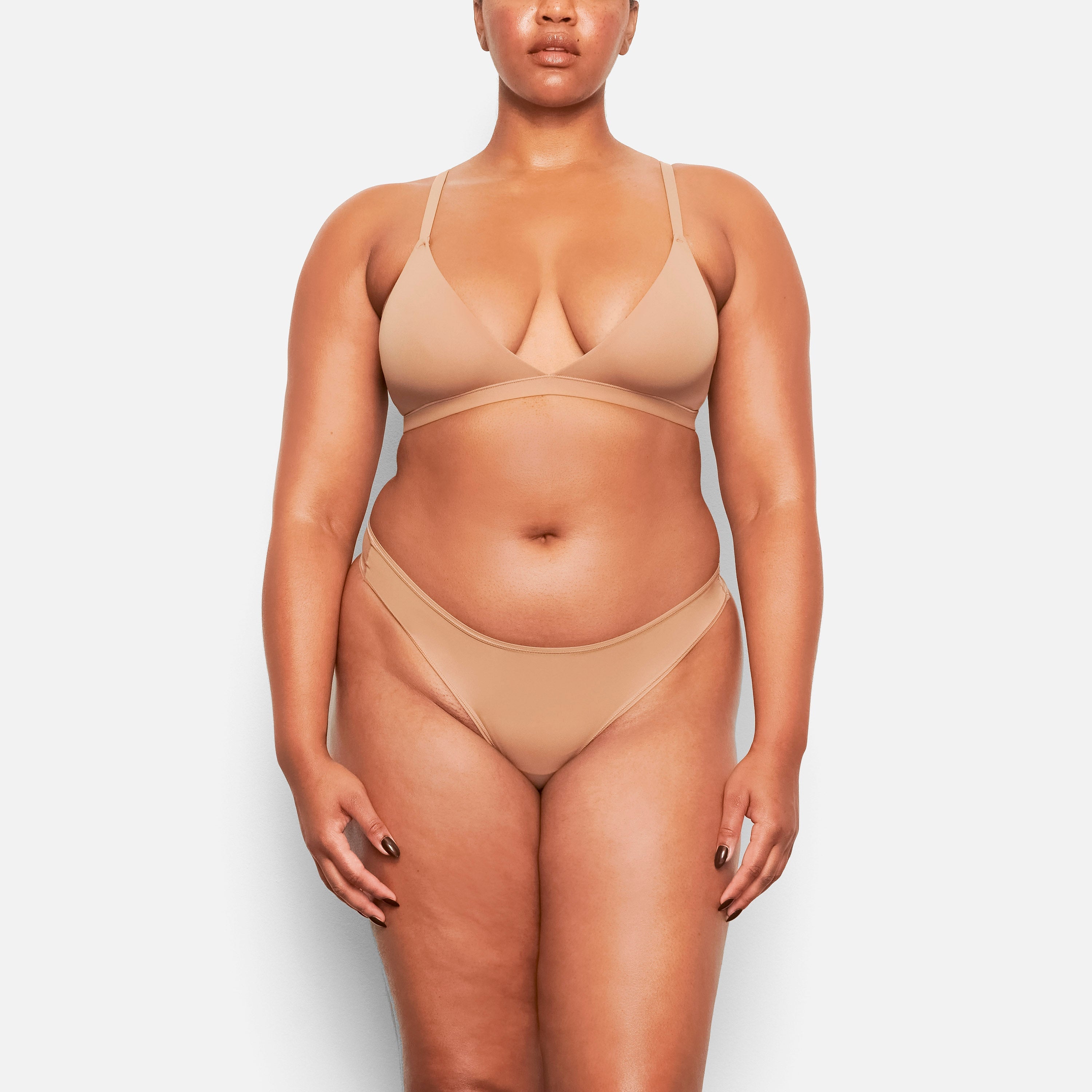 ON A MODEL FRONT VIEW FITS EVERYBODY TRIANGLE BRALETTE IN SIENNA, XL