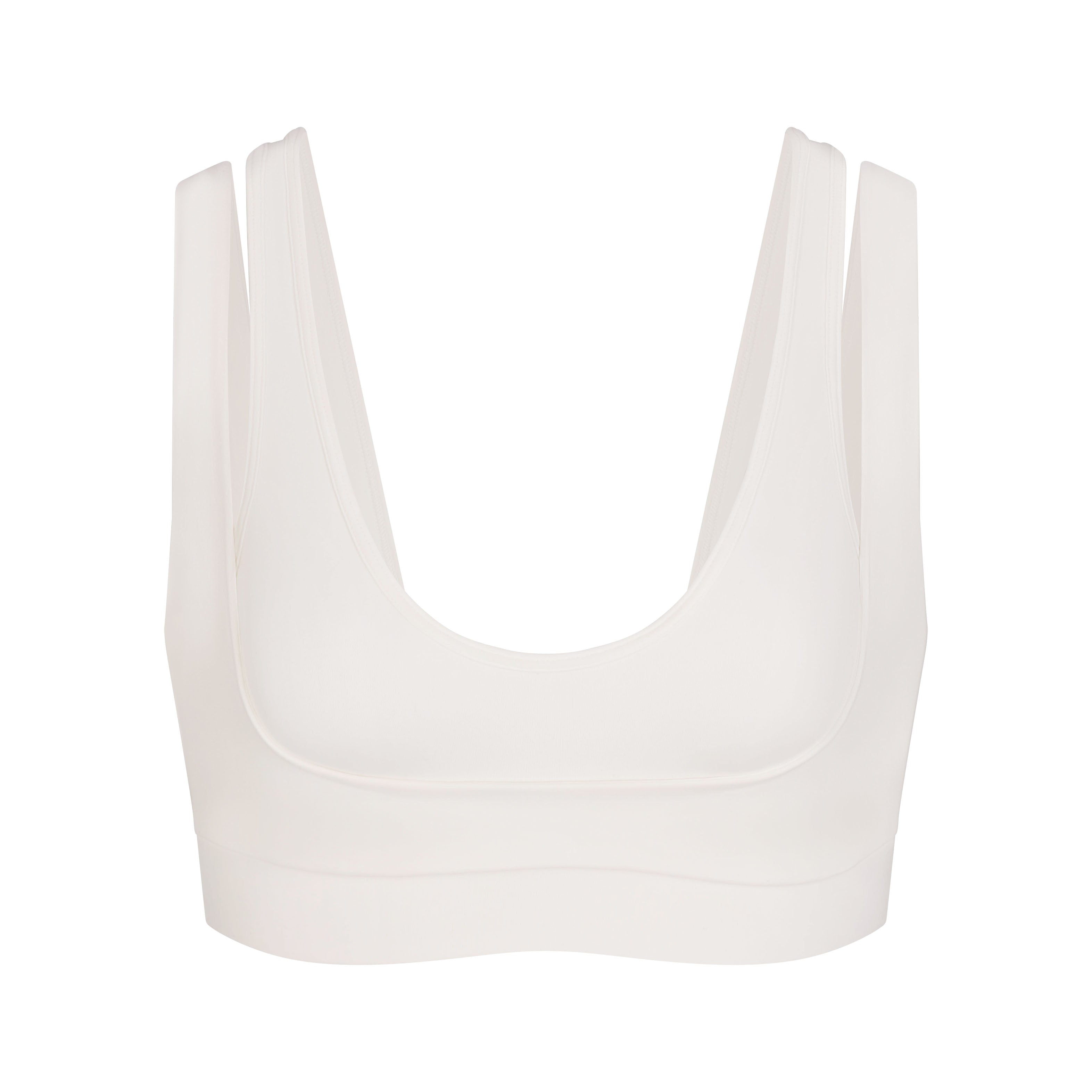 NikeSKIMS MATTE DOUBLE STRAP SCOOP BRA | IVORY LAYS FLAT ON A WHITE BACKGROUND | FLT