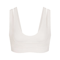 NikeSKIMS MATTE DOUBLE STRAP SCOOP BRA | IVORY LAYS FLAT ON A WHITE BACKGROUND | FLT