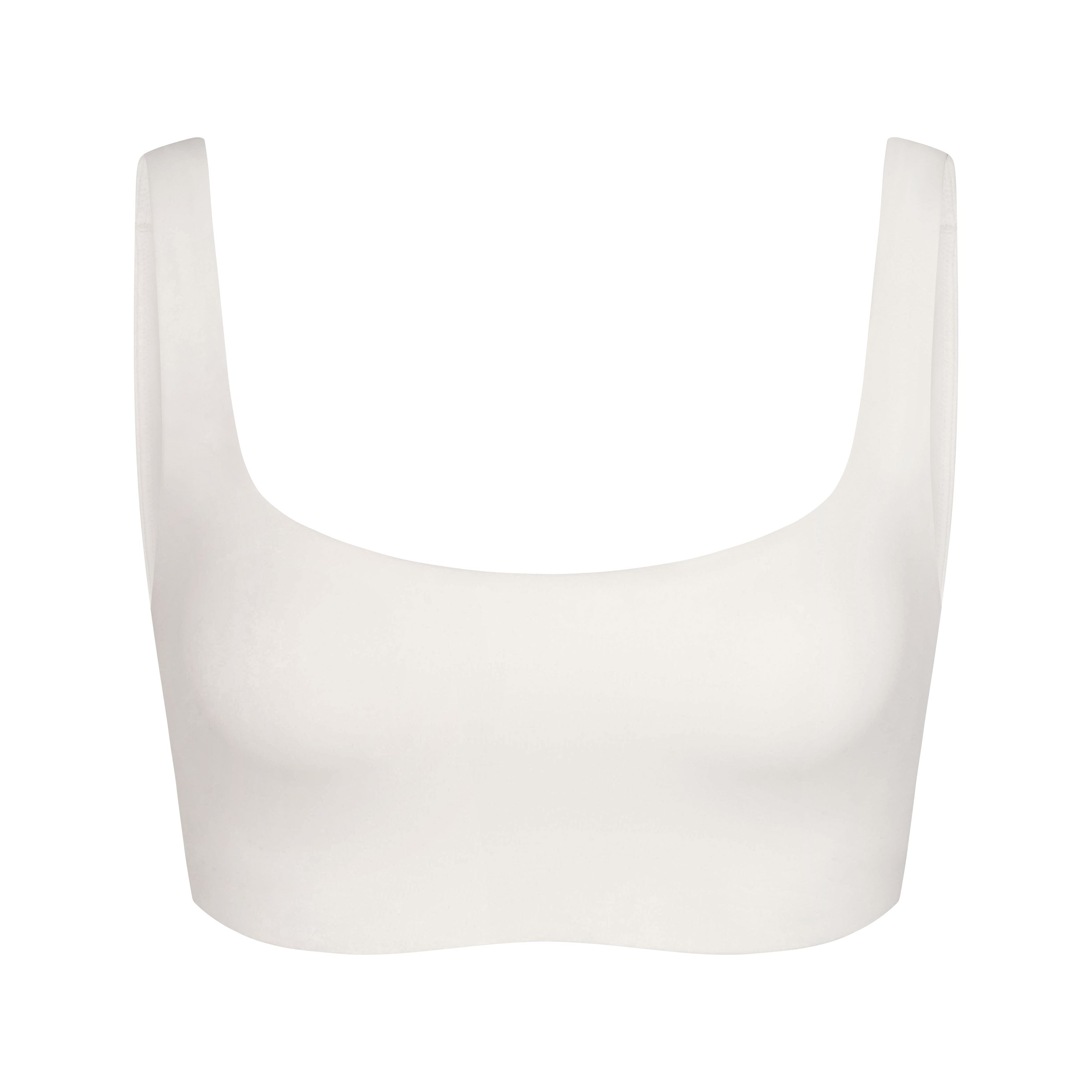 NikeSKIMS MATTE SCOOP NECK BRA | IVORY LAYS FLAT ON A WHITE BACKGROUND | FLT