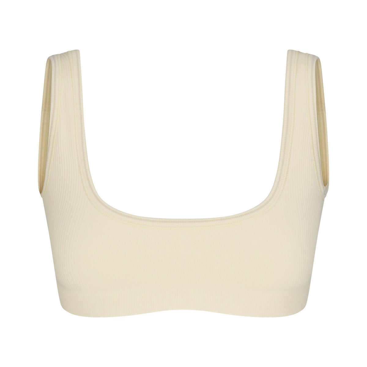 NikeSKIMS RIBBED SEAMLESS MICRO SCOOP BRA | LEMON DROP & LAYS FLAT ON A WHITE BACKGROUND | FLT