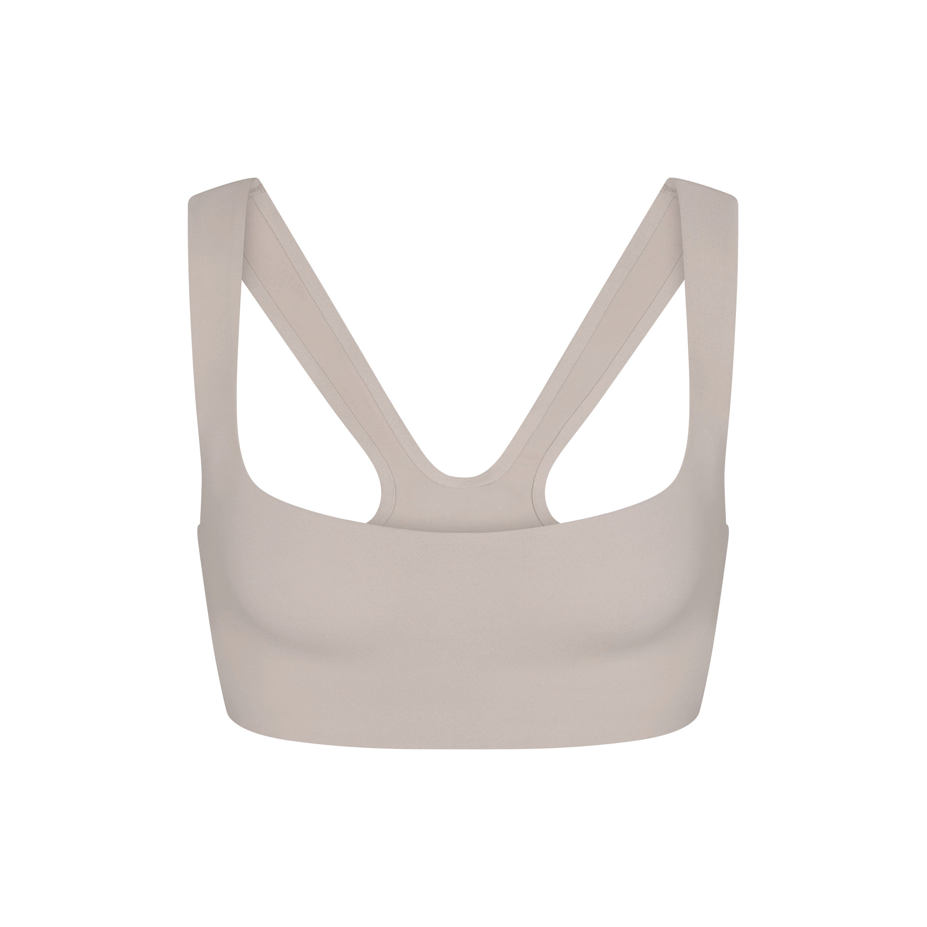 NikeSKIMS STUDIO STRETCH RACER BACK BRA | LINEN LAYS FLAT ON A WHITE BACKGROUND | FLT