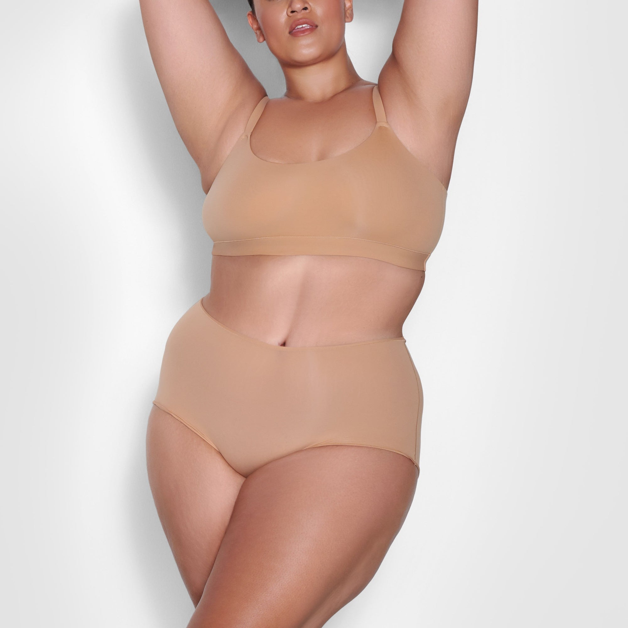 ON A MODEL FRONT VIEW FITS EVERYBODY SCOOP NECK BRA IN OCHRE 