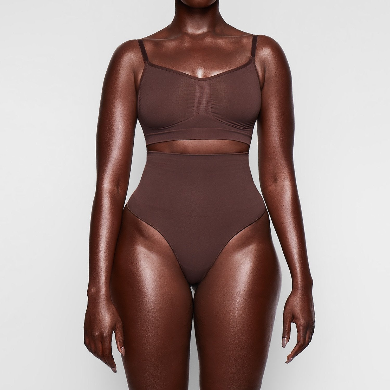 SEAMLESS SCULPT BRALETTE WORN BY A MODEL IN FRONT VIEW, XL
