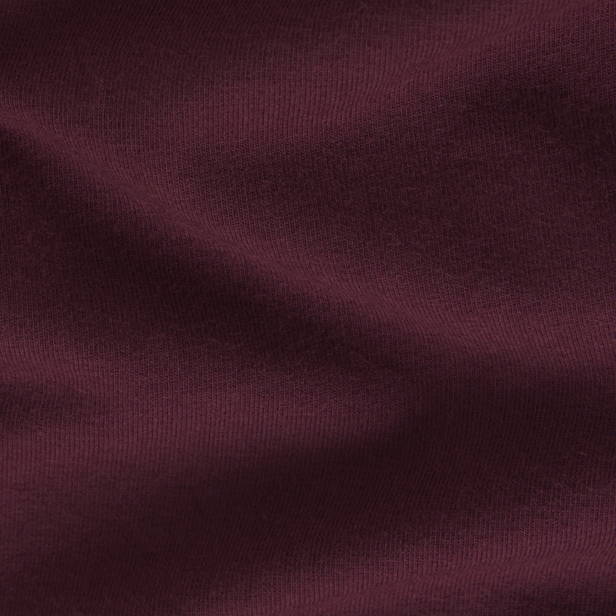 COTTON JERSEY LONG SLEEVE T-SHIRT | CURRANT & LAYS FLAT ON A WHITE BACKGROUND | FLT