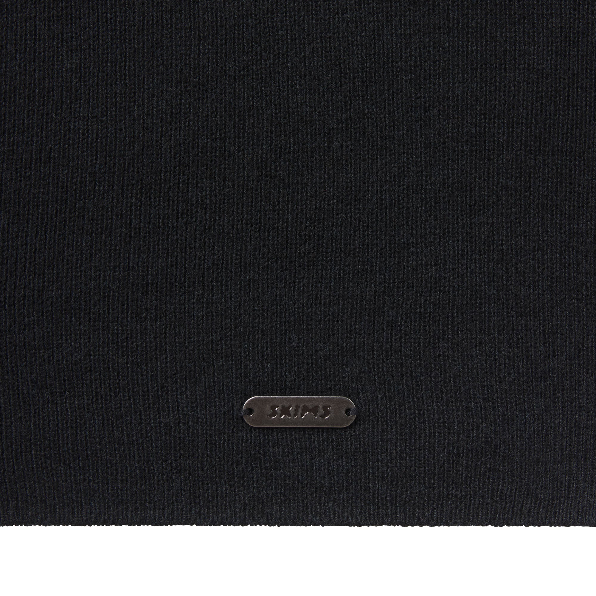 ESSENTIAL SWEATERS ROUNDED CROPPED CARDIGAN | ONYX & LAYS FLAT ON A WHITE BACKGROUND | FLT