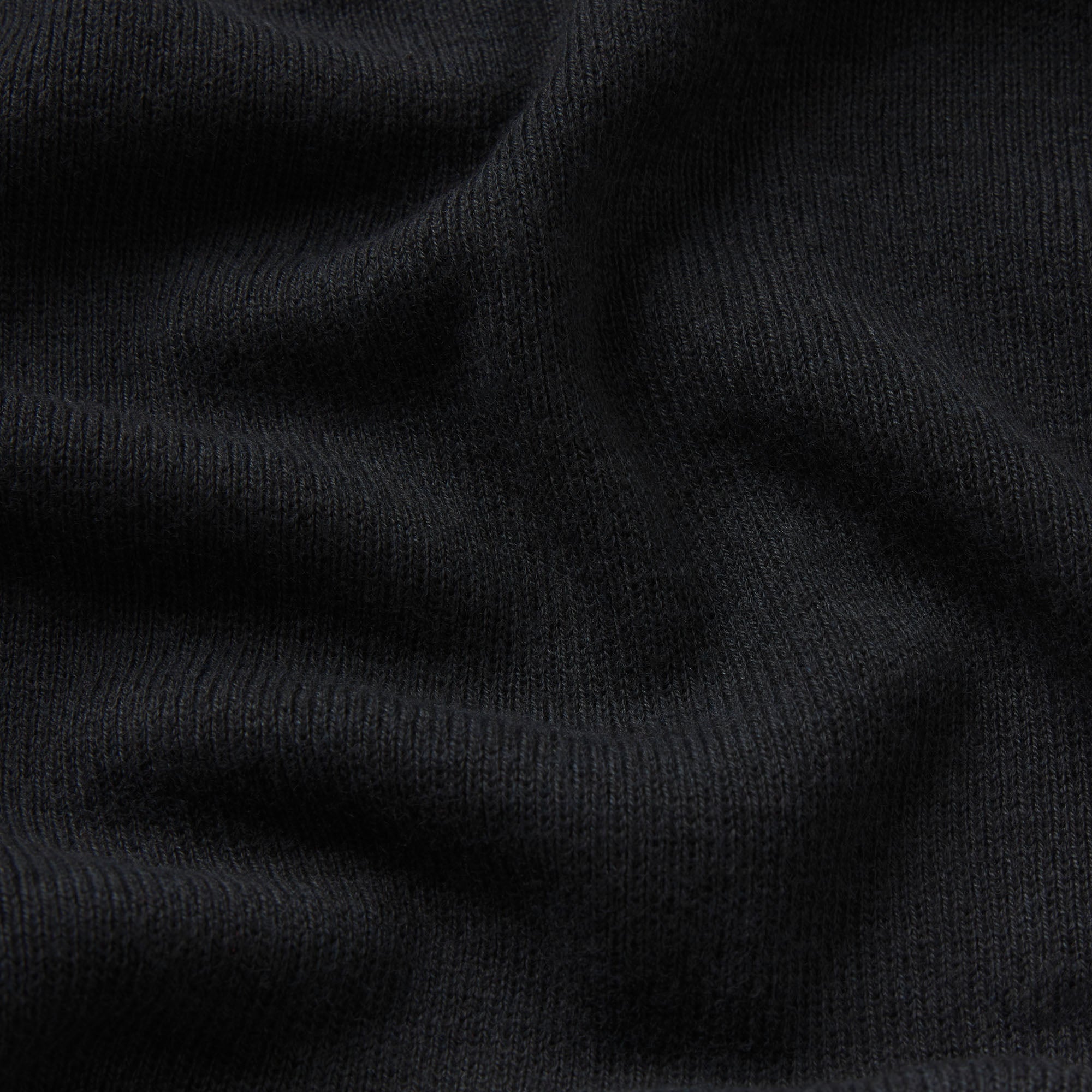 ESSENTIAL SWEATERS ROUNDED CROPPED CARDIGAN | ONYX & LAYS FLAT ON A WHITE BACKGROUND | FLT