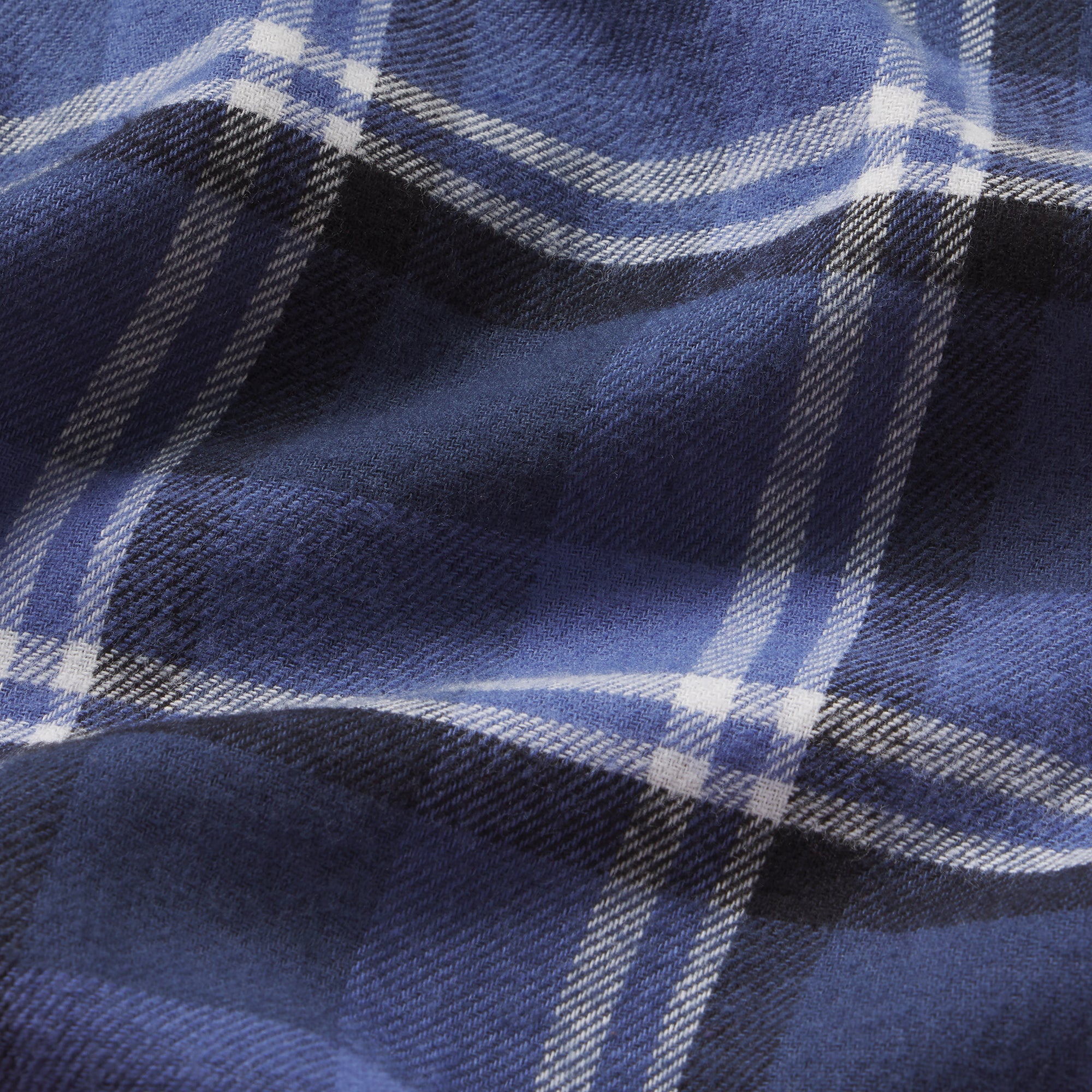 FLANNEL SLEEP CHEEKY BOXER | INDIGO OUTDOOR PLAID & LAYS FLAT ON A WHITE BACKGROUND | FLT
