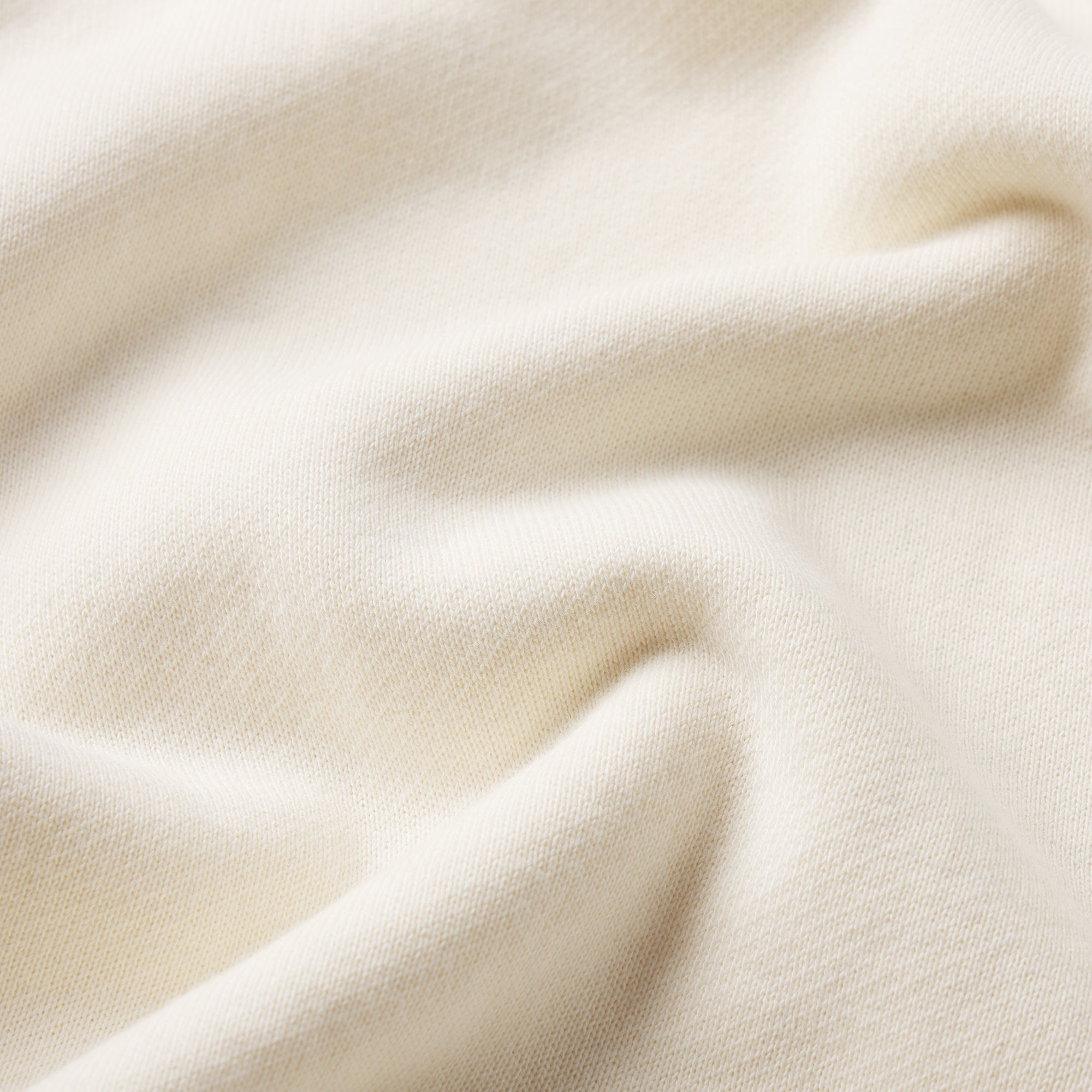 FRENCH TERRY ZIP UP HOODIE | ECRU ON A MODEL FRONT VIEW @ | FOCUS: 0.0, 1.0, 0.9