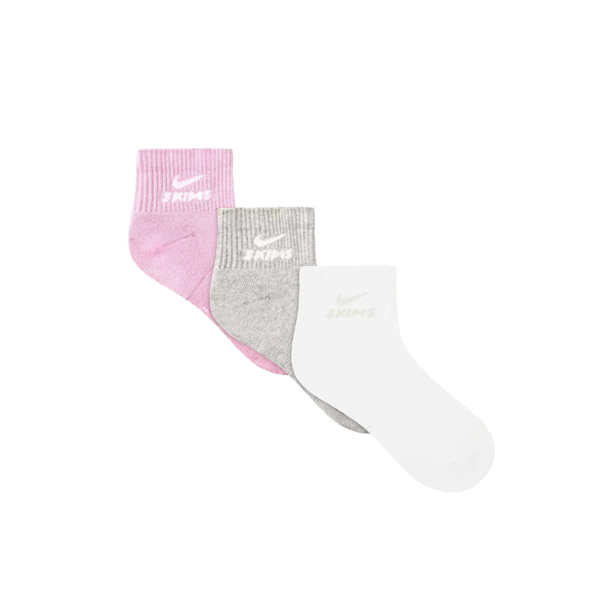 NikeSKIMS ACCESSORIES DRI-FIT QUARTER CREW SOCK 3-PACK | BUBBLE GUM MULTI LAYS FLAT ON A WHITE BACKGROUND | FLT @ | FOCUS: 0.0, 1.0, 0.9