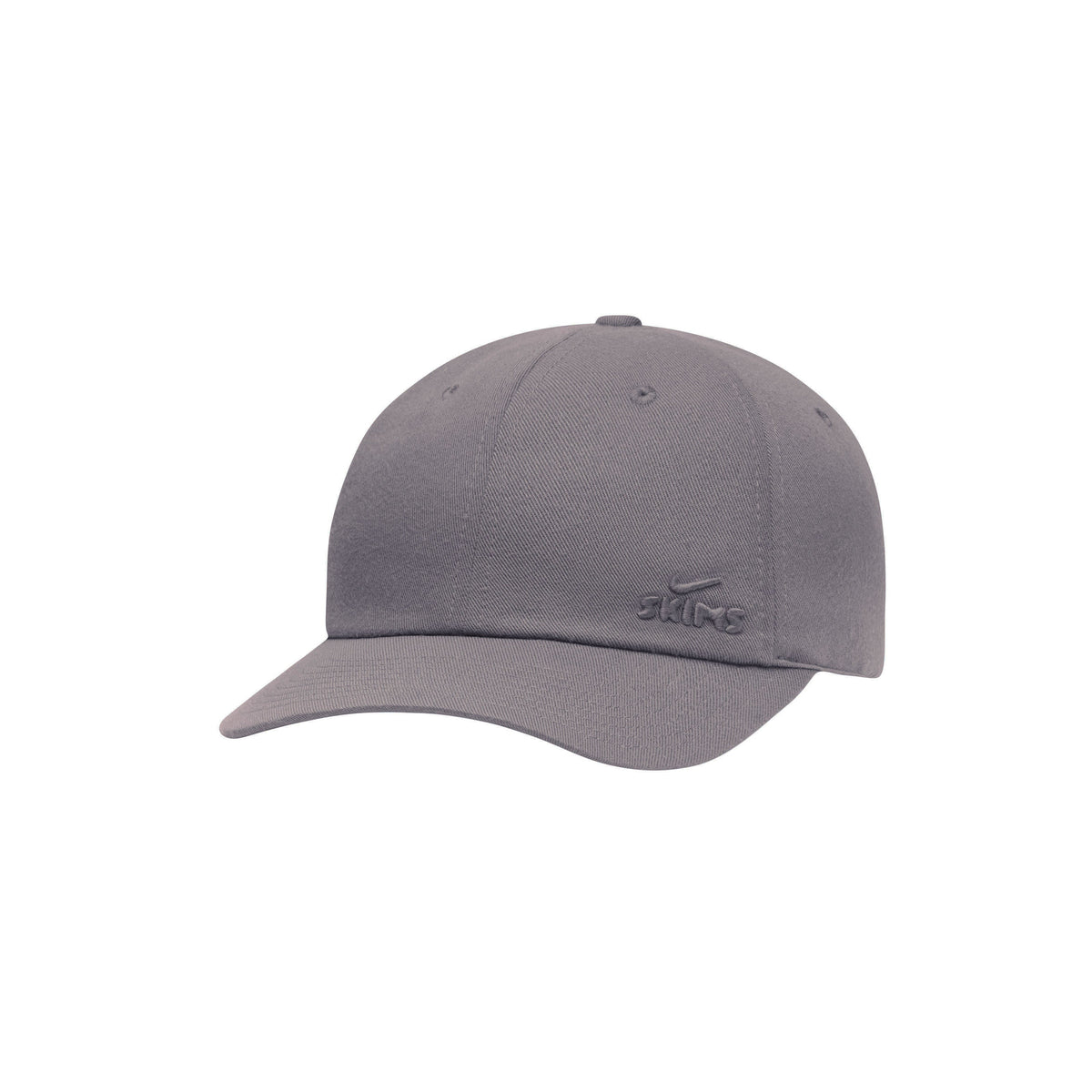 NikeSKIMS ACCESSORIES CLUB CAP | ARMOR LAYS FLAT ON A WHITE BACKGROUND