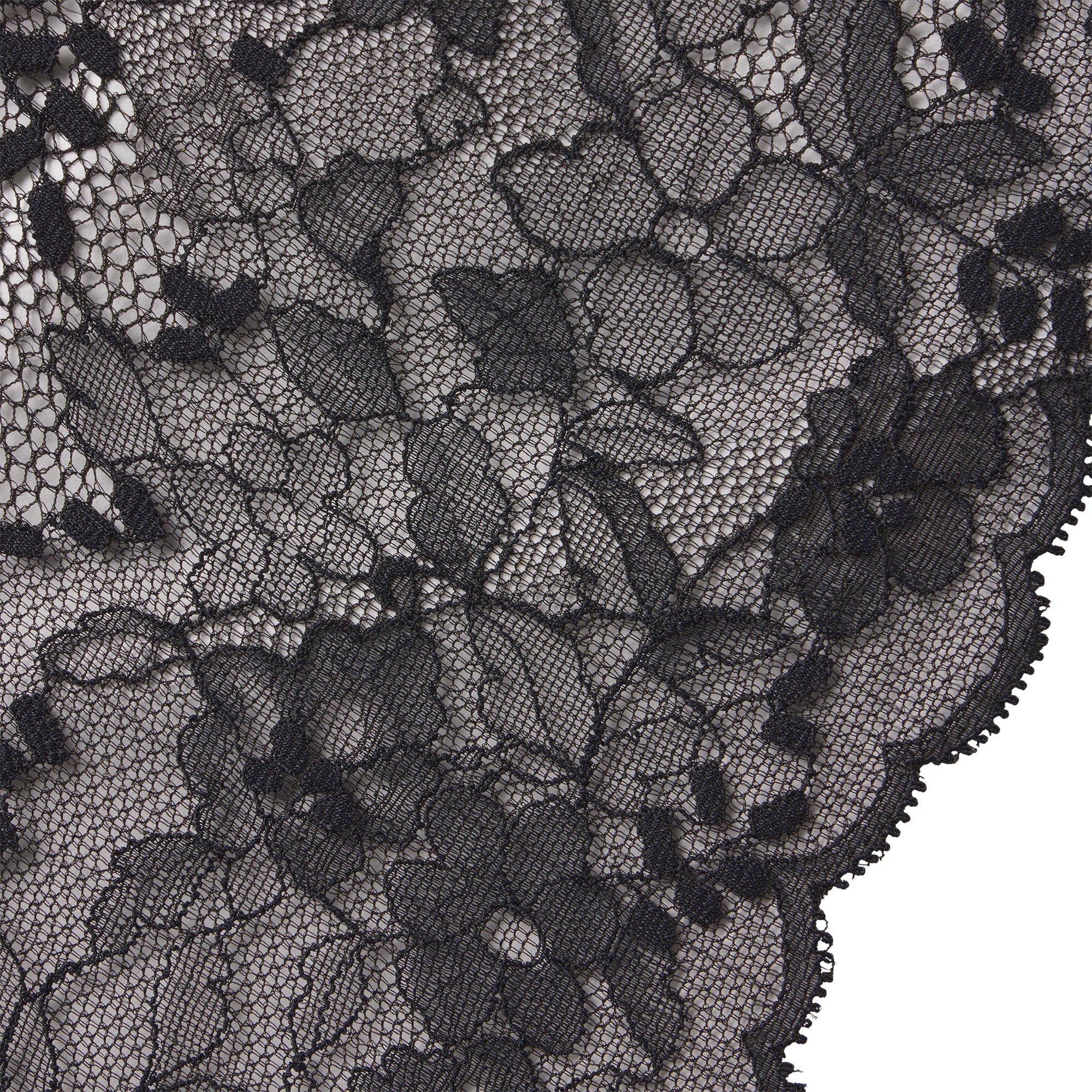 SKIMS LACE UNLINED MINIMIZER BRA | ONYX ON A MODEL FRONT VIEW @ | FOCUS: 0.0, 1.0, 0.9