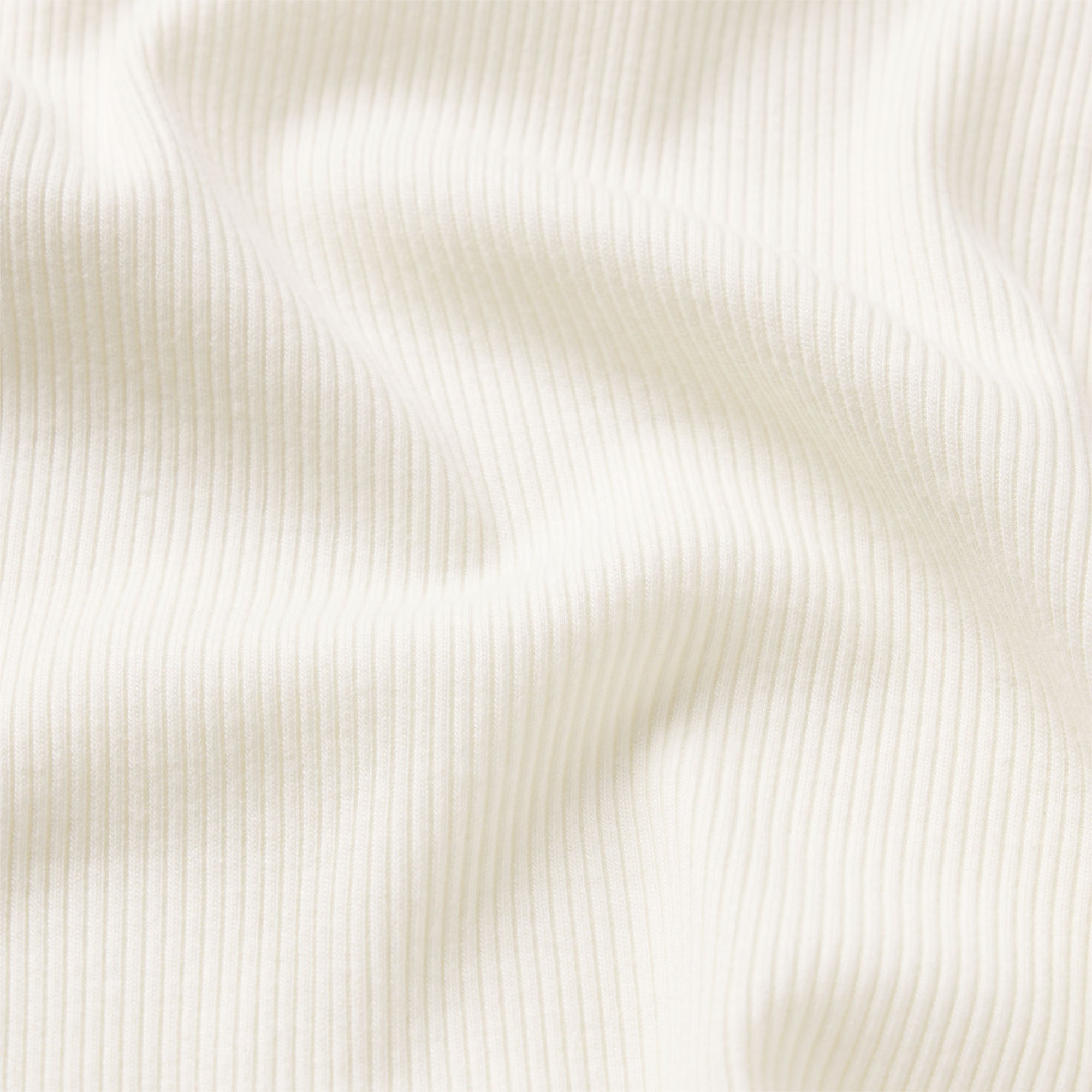 RIB SLEEP TANK | IVORY & LAYS FLAT ON A WHITE BACKGROUND | FLT