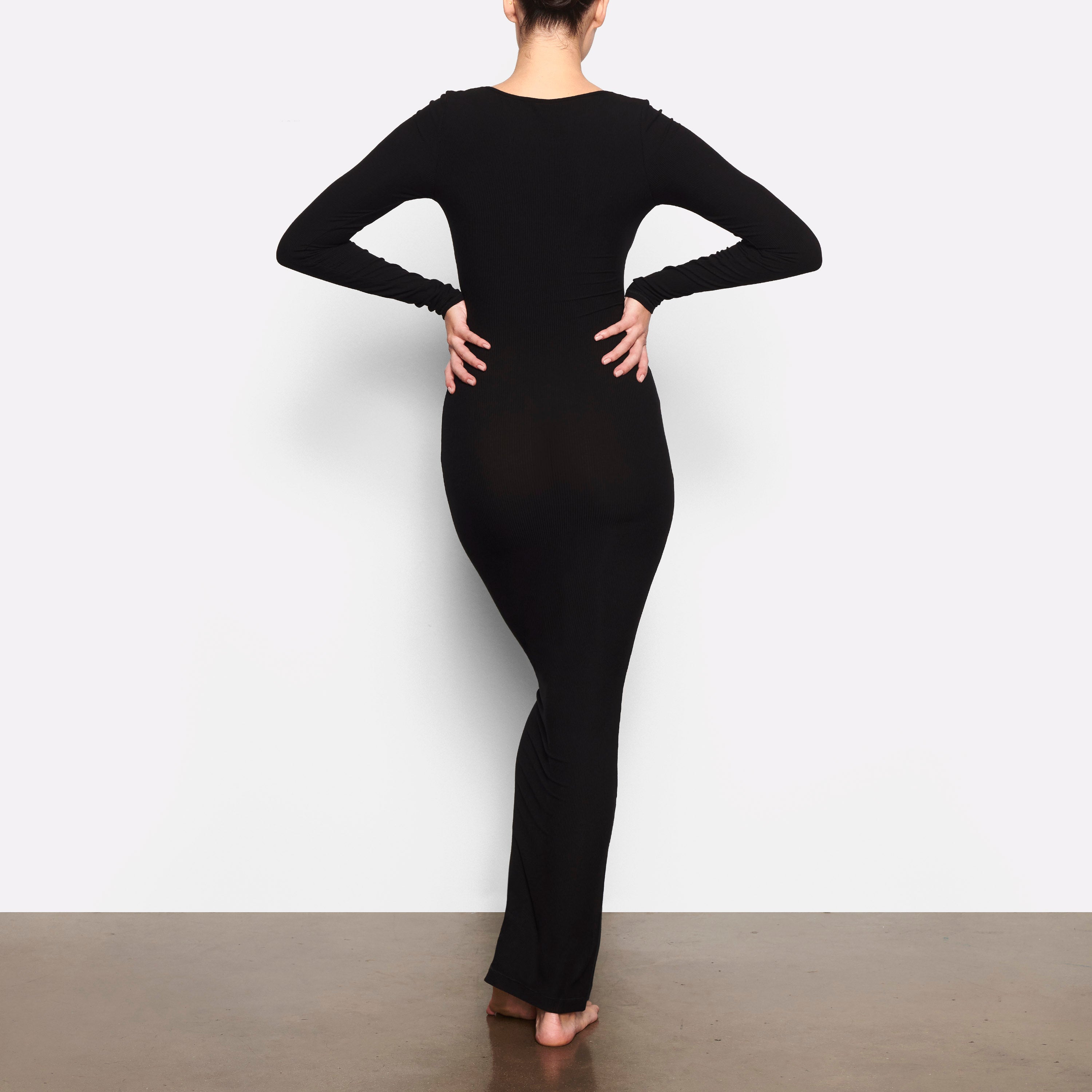WORN BY A MODEL IN BACK VIEW SOFT LOUNGE LONG SLEEVE DRESS IN ONYX