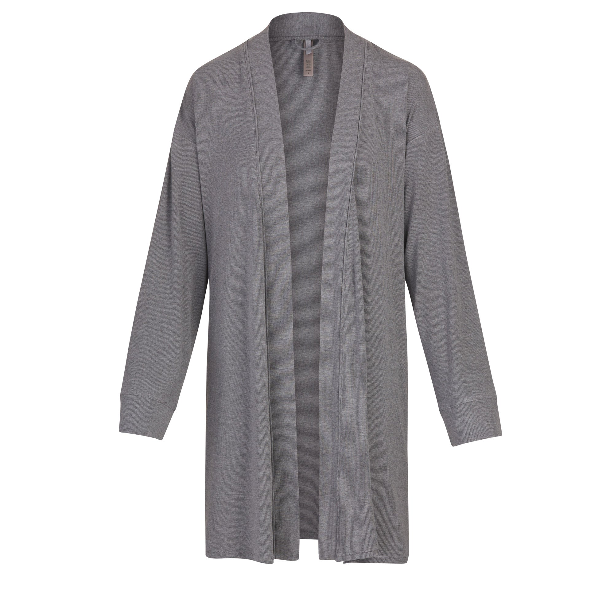 SOFT LOUNGE ROBE IS SHOWN ON A MODEL POSING IN STYLISTIC CAMPAIGN IMAGERY