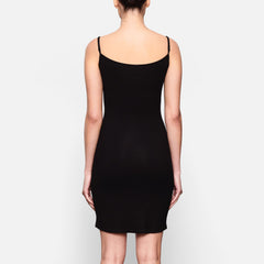 WORN BY A MODEL IN BACK VIEW SOFT LOUNGE SLIP DRESS