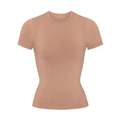 SOFT SMOOTHING T-SHIRT LAYS FLAT ON A WHITE BACKGROUND | FLT