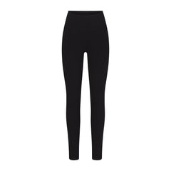 OUTDOOR HIGH-WAISTED LEGGING | ONYX (LEGGINGS, BOTTOMS) LAYS FLAT ON A WHITE BACKGROUND | FLT